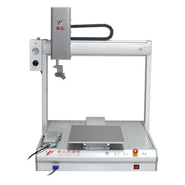 Desktop-type four-axis glue dispensing machine with dual station